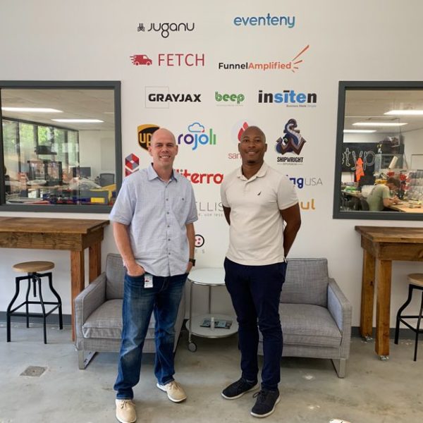 Two men posing at the Innovation Center